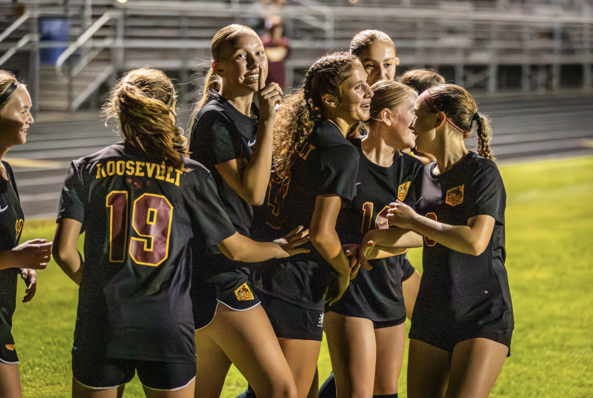 Roosevelt Girls Soccer celebrating a goal 