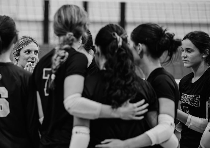 RHS Varsity Volleyball during timeout at Senior Night